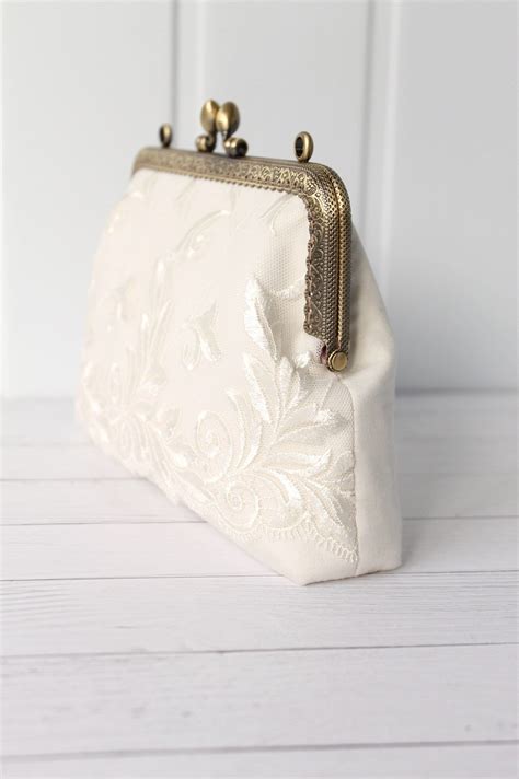 small ivory clutch bag